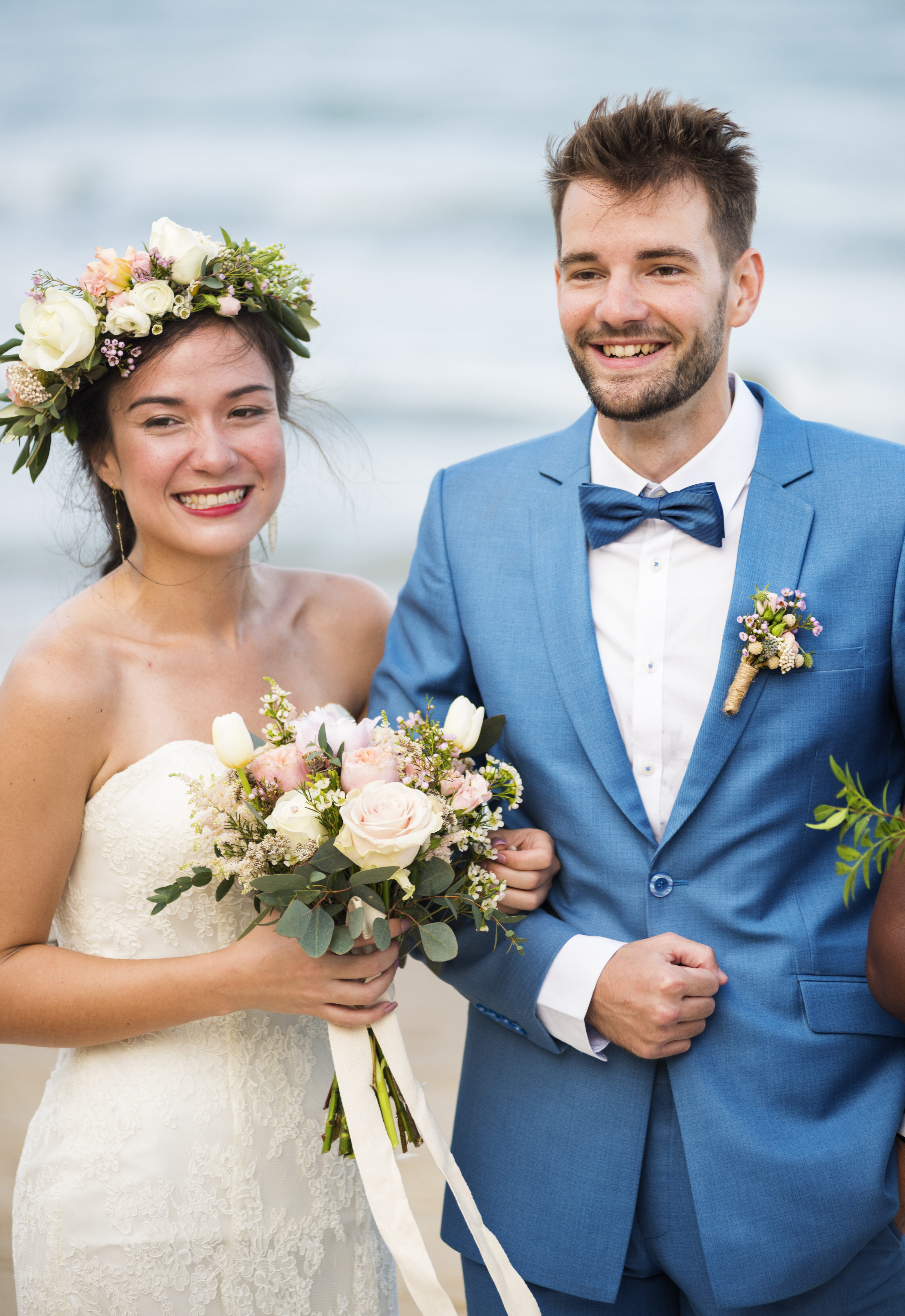 Young couple in a wedding ceremony at the beach